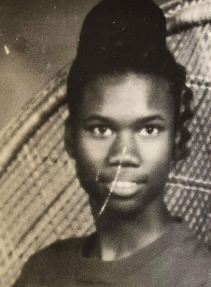 A young track star in a black and white portrait, central to the story of her being slain. A young track star in a black and white portrait, central to the story of her being slain.