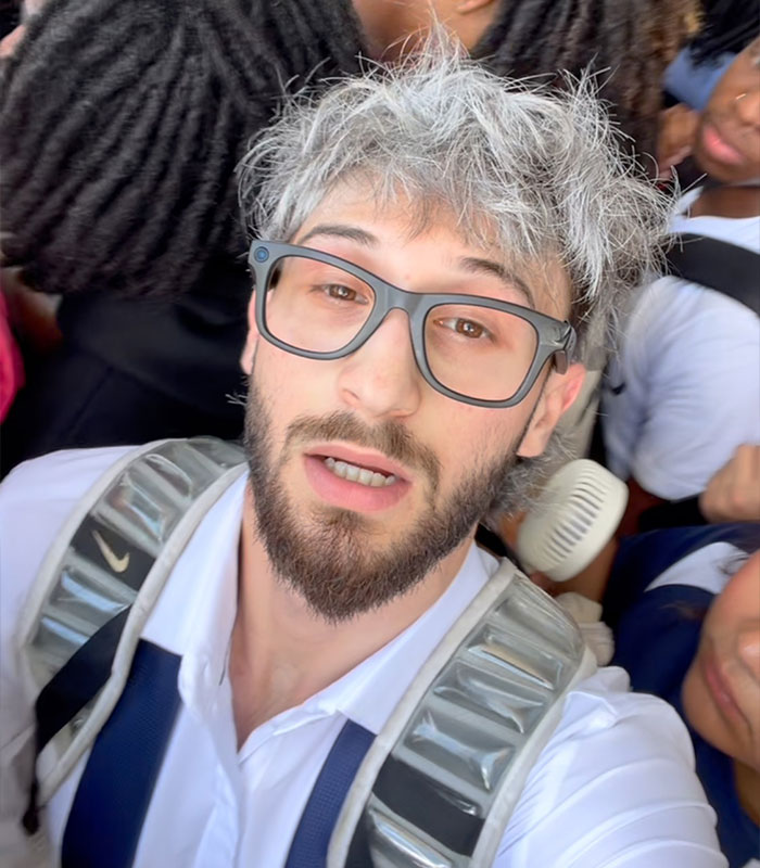 Man with grey hair and glasses, part of the 1000 men from Bonnie Blue's baby shower scandal. Man with grey hair and glasses, part of the 1000 men from Bonnie Blue's baby shower scandal.