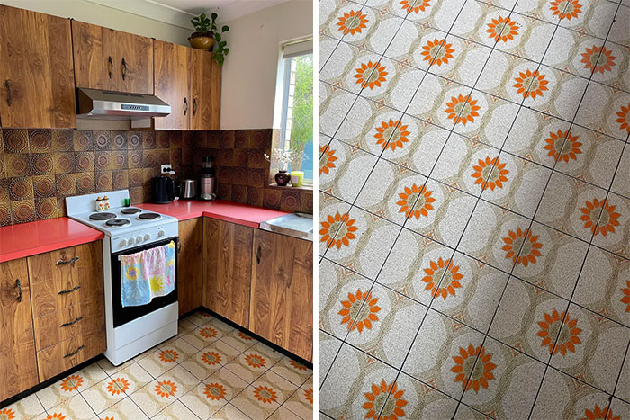 A kitchen showcasing 1970s and 1980s interior design with wood cabinets, orange countertops, patterned backsplash, and floral-patterned floor tiles.