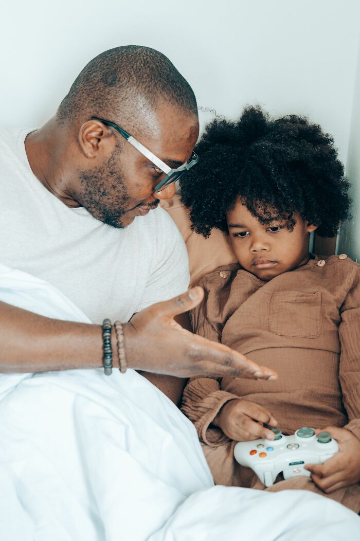 Parenting expert discussing kids understanding and confusion while playing video games with a child.