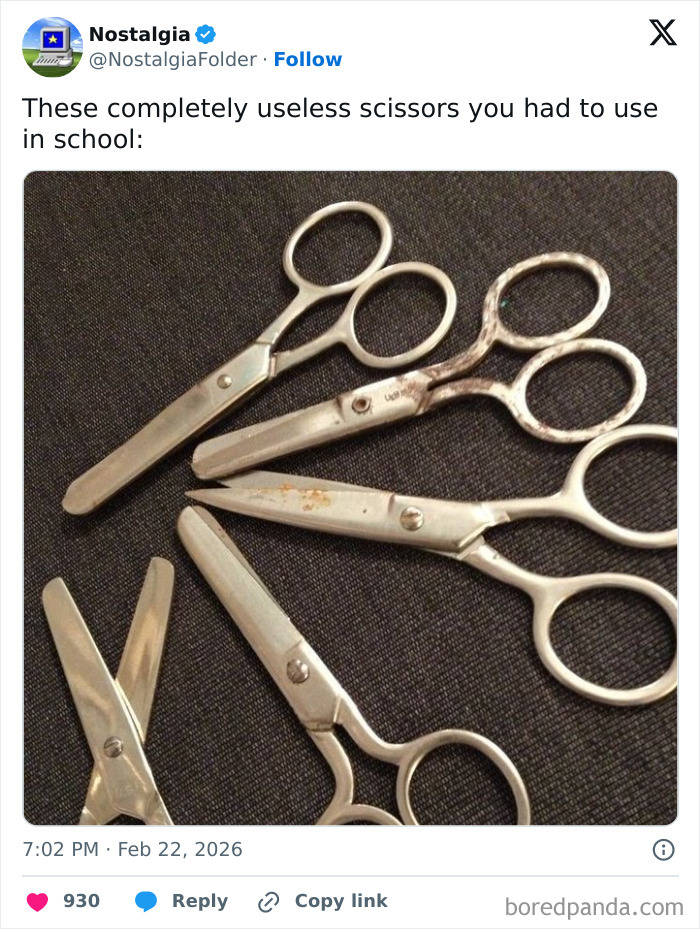 Several old, worn-out metal scissors, reminiscent of school days and forgotten nostalgia.