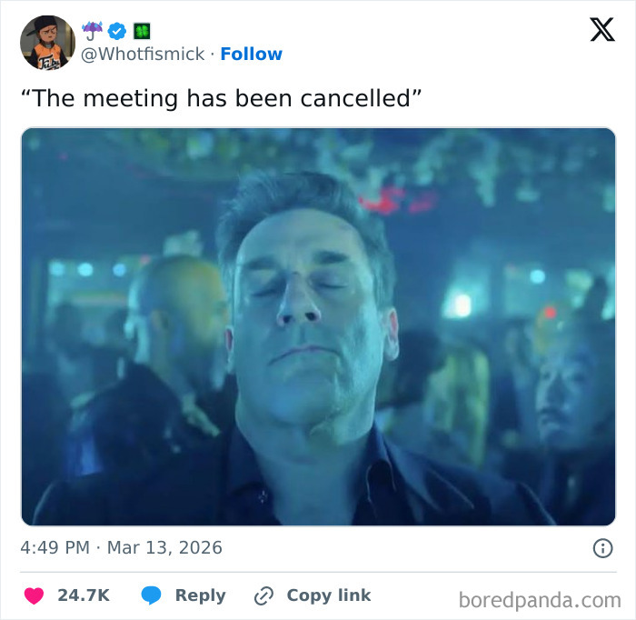 A man with closed eyes in a dimly lit room, reacting to a tweet about a meeting cancellation, reflecting 9-to-5 life realities.