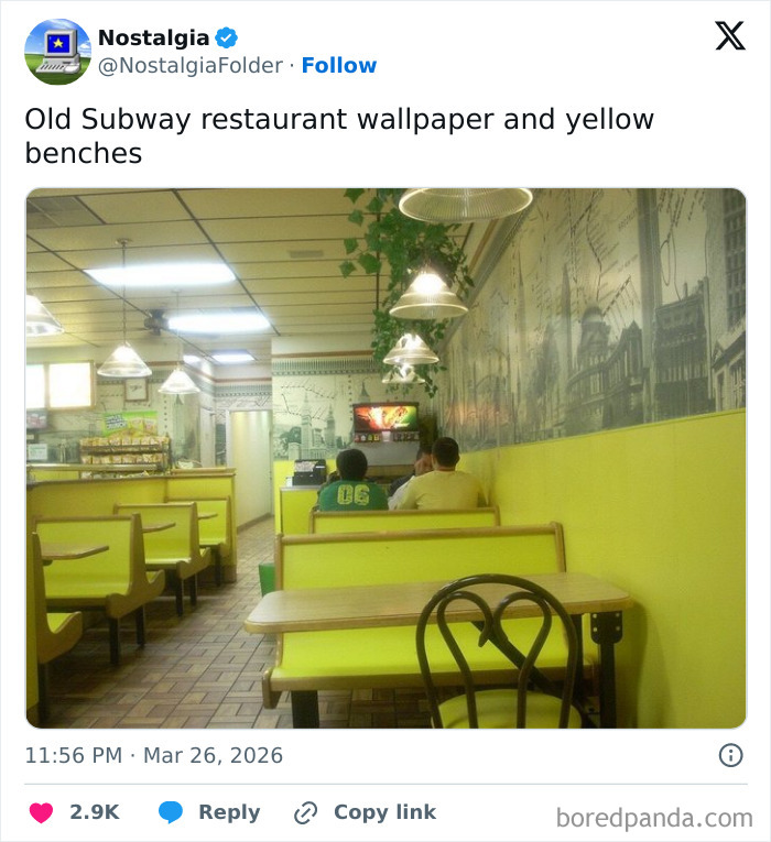 An old Subway restaurant interior with yellow benches and historical map wallpaper, a nostalgic image for those who remember.