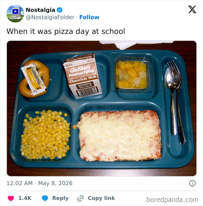 A school lunch tray with pizza, corn, fruit, chocolate milk, and a pretzel. This image is from the Nostalgia Folder and will make you remember things you have long forgotten.
