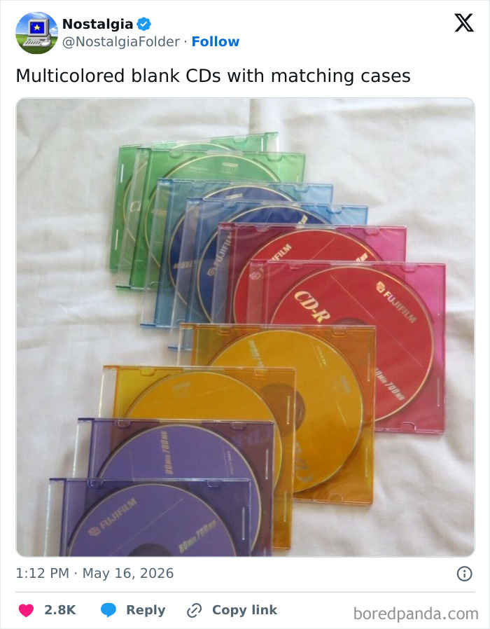 Image from Nostalgia Folder showing multicolored blank CDs with matching cases, a nostalgic reminder of past technology.