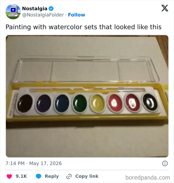 Image from Nostalgia Folder of a watercolor set with classic round pans, evoking artistic childhood memories.