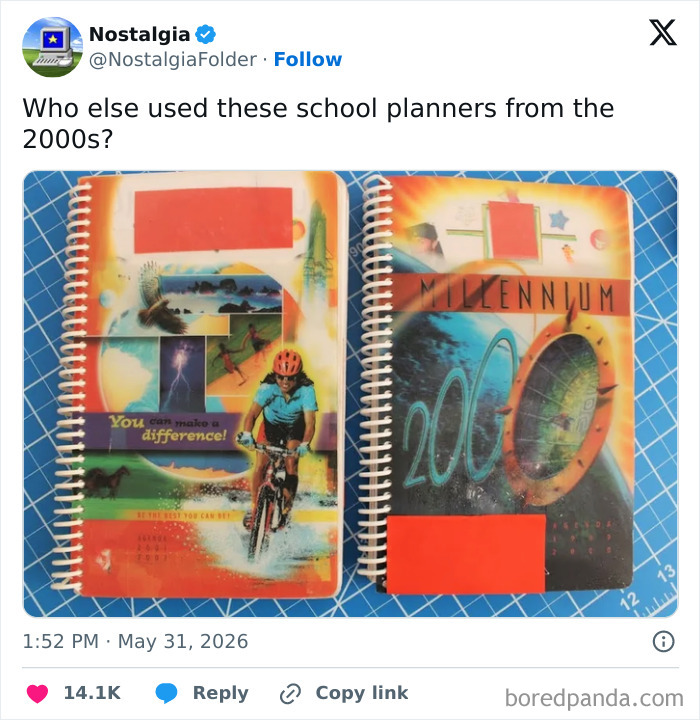 Two spiral-bound school planners from the 2000s, with various images and the word 'Millennium,' a nostalgic school item.