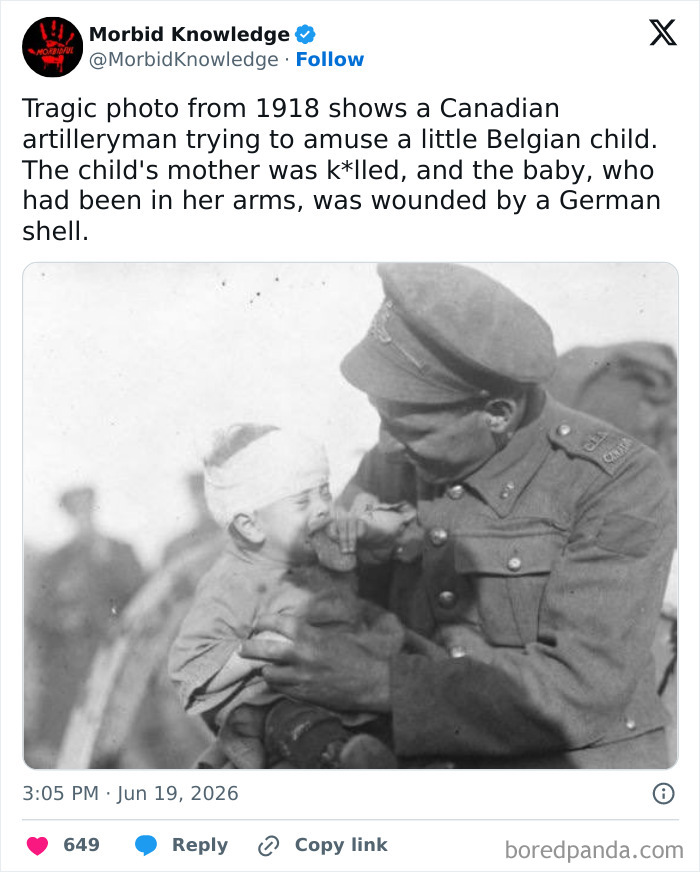 A Canadian artilleryman holding a Belgian child for morbid and sad stories.
