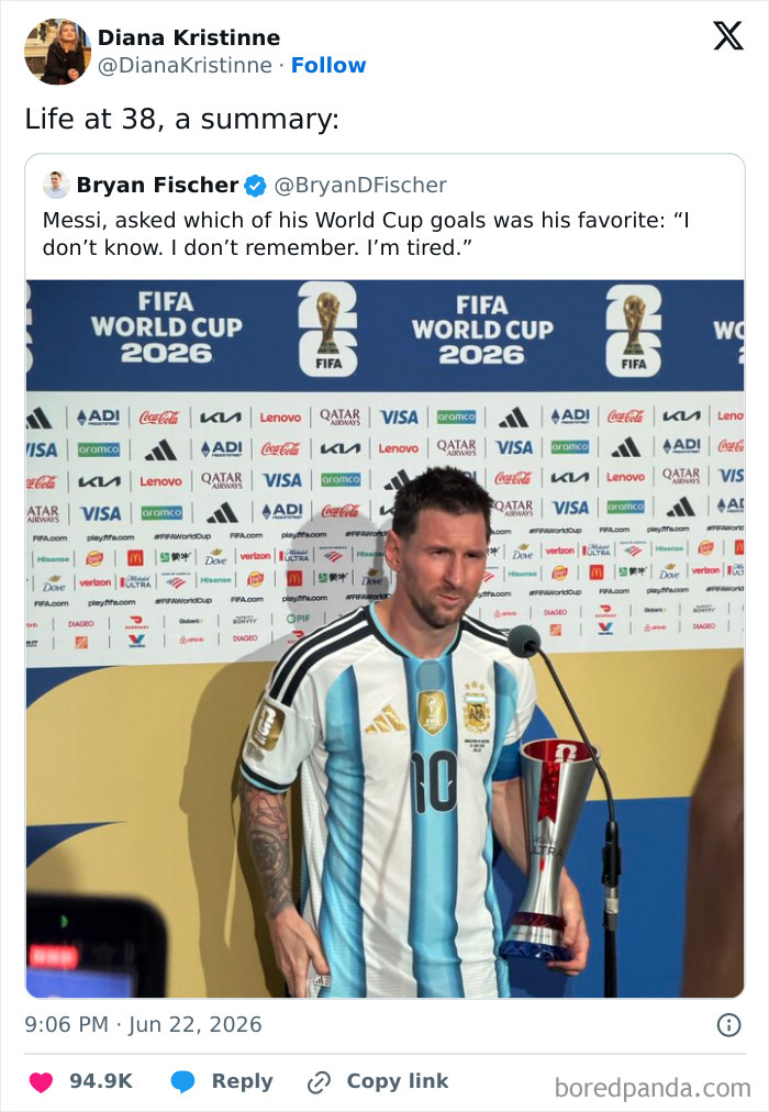 A World Cup tweet showing Lionel Messi looking tired at a press conference, holding a trophy.