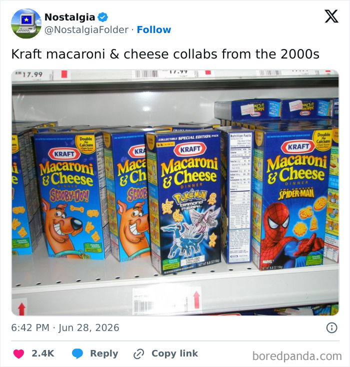 A supermarket shelf with various Kraft Macaroni & Cheese boxes featuring nostalgic character collaborations.