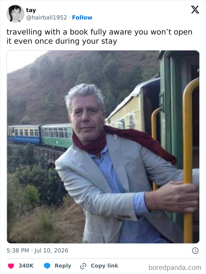 A funny tweet showing Anthony Bourdain on a train, captioned about travelling with a book in July.