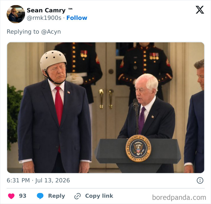 Donald Trump wearing a special helmet at a podium with another man speaking, causing instant mockery and laughter.
