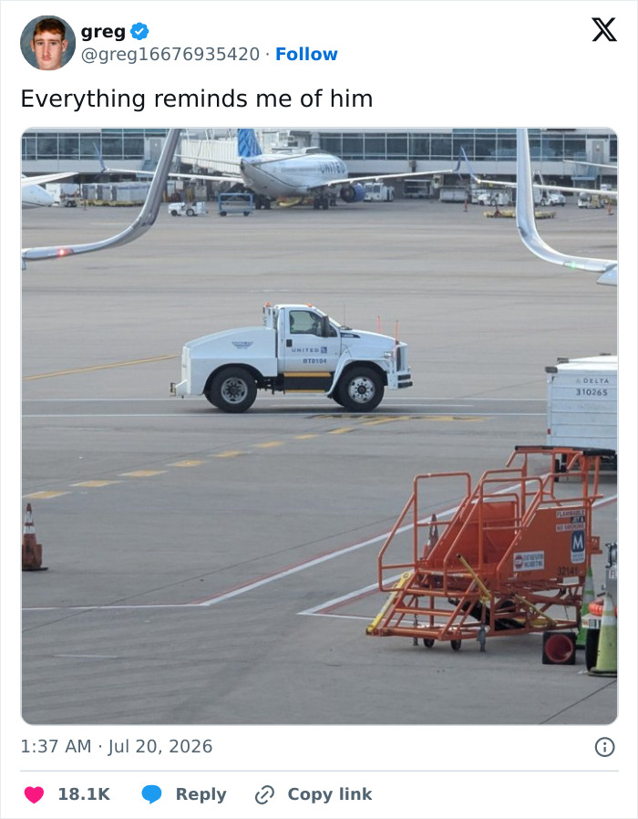 A white airport tow truck at an airport, resembling the unusually shaped raccoon Jimothy, as part of a Jimothy meme.