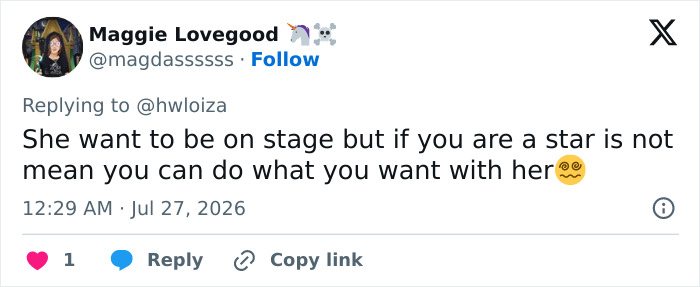 A woman on stage with Usher, creating an awkward reaction to his seductive moves. She breaks her silence with a savage post.