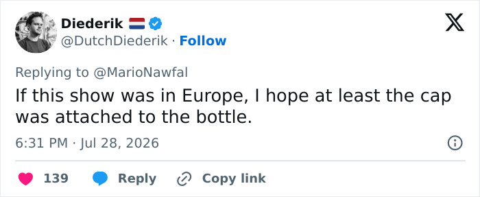 A tweet by Diederik, a blue-checked user, about Katy Perry's bizarre stunt, hoping the bottle cap was attached.