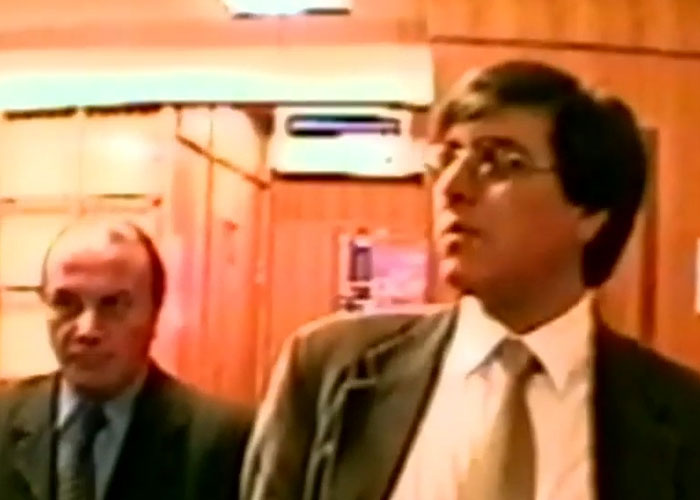 Two men, one in focus, suggesting the investigation into a disappeared man's horrific fate.
