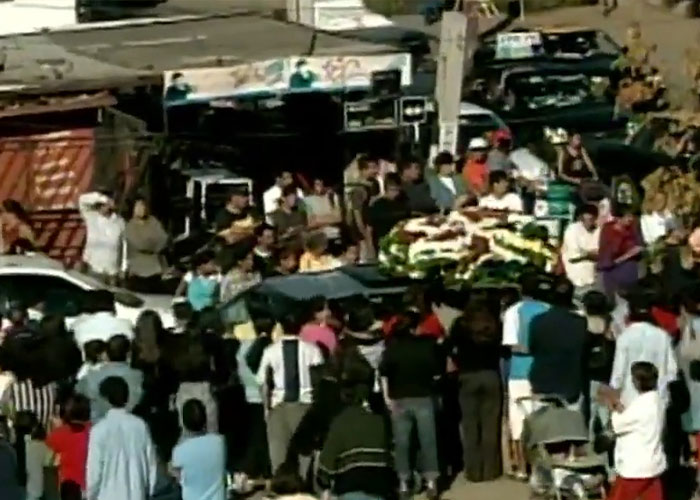 Crowd gathered for the disappeared man, a solemn scene after his horrific fate was revealed.