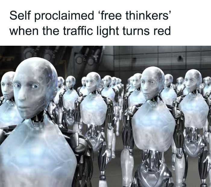 A cringe meme showing an army of identical robots, representing free thinkers stopping at a red traffic light.