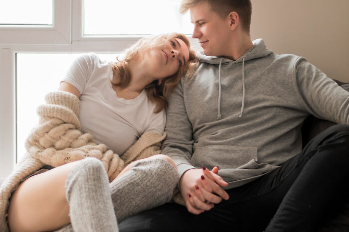 Couple relaxing at home, representing trends and items that completely swapped audiences.