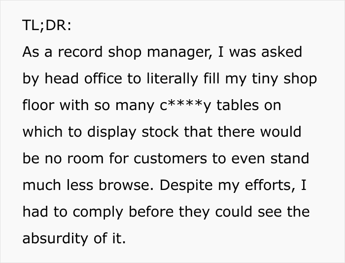 White background with black text summarizing a record shop manager's compliance with a boss's stupid idea, blocking customer access. White background with black text summarizing a record shop manager's compliance with a boss's stupid idea, blocking customer access.