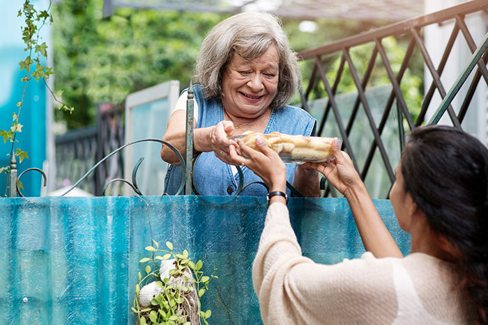 Elderly guy calls animal control to save neglected dog. An elderly woman receives food from a younger woman, showing good neighbors. Elderly guy calls animal control to save neglected dog. An elderly woman receives food from a younger woman, showing good neighbors.