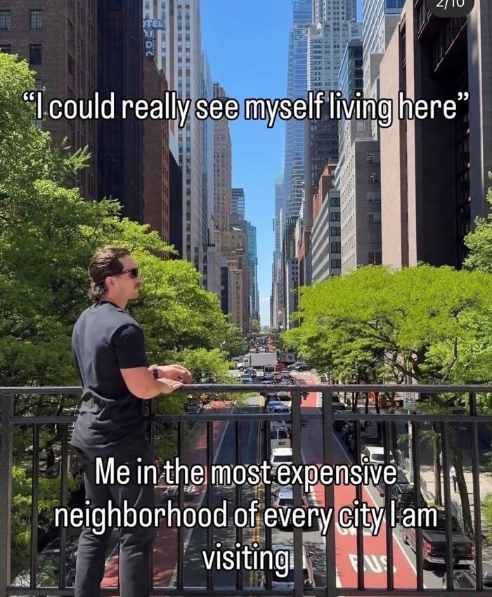 Man looking at a city skyline, with the text 'I could really see myself living here' and 'Me in the most expensive neighborhood of every city I am visiting' as a relatable meme.
