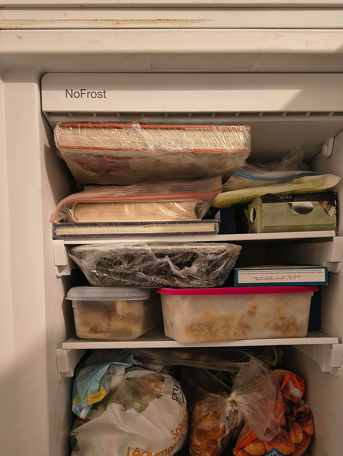 Hilariously dumb warning label: A freezer full of books instead of food, an uncommon sight.