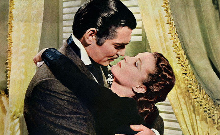 Classic scene from Gone With The Wind showing characters Scarlett O'Hara and Rhett Butler embracing, amidst Netflix boycott. Classic scene from Gone With The Wind showing characters Scarlett O'Hara and Rhett Butler embracing, amidst Netflix boycott.