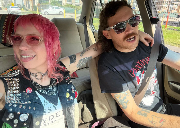 A Canadian woman and man in a car. The woman is accused of slapping a teen.