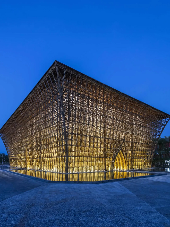 Modern Architecture Designs: An illuminated bamboo structure with a complex weave, an amazing example of modern design.