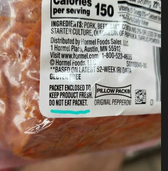 A close-up of a pepperoni packet with a warning label that says DO NOT EAT PACKET, highlighting cultural decline.