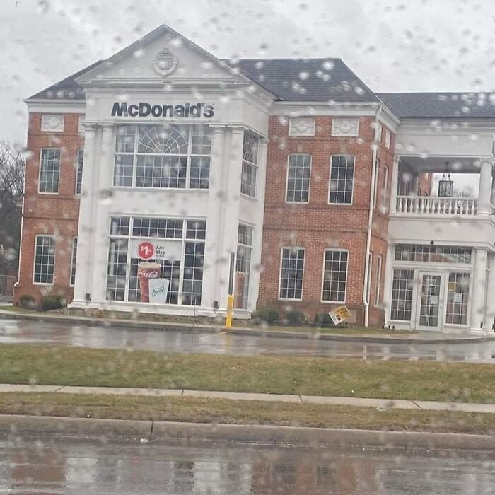 A creepy and confusing McDonald's building with traditional architecture, one of the strange images.