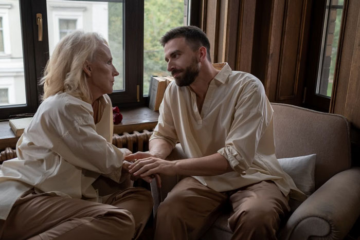 A MIL and DIL talking about family issues, possibly involving an eviction and jail.