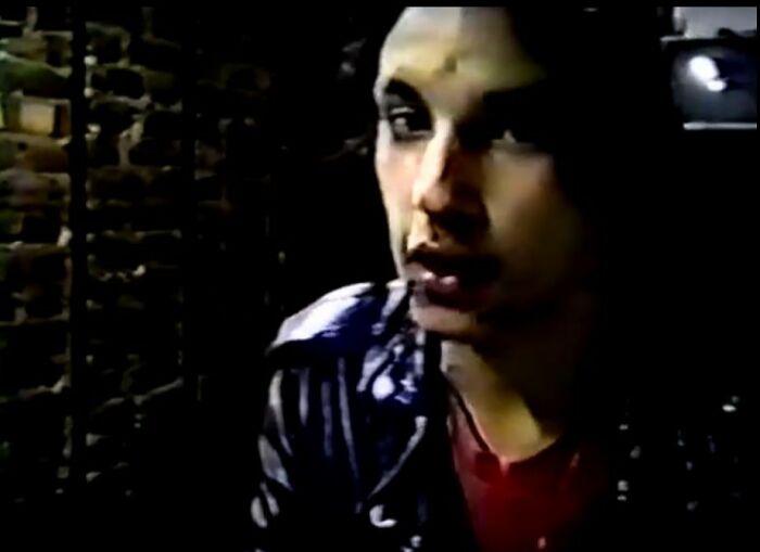 A grainy, dark image of a man looking intently, adding to the internet's creepy unsolved mysteries.