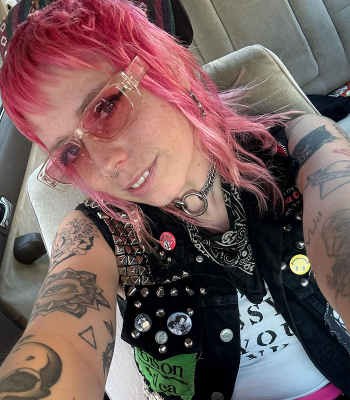 Canadian woman with pink hair, sunglasses, and studded vest accused of slapping Jersey Shore teen.