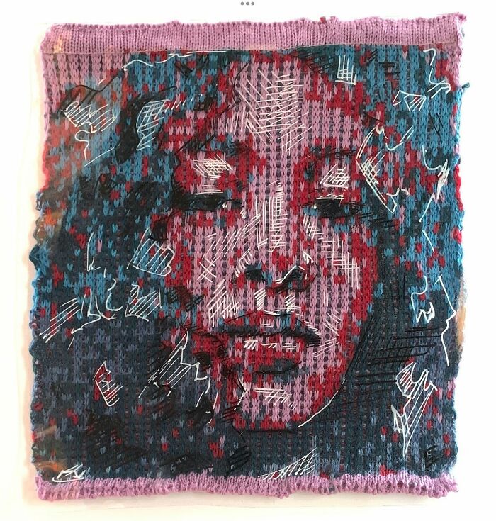 A colorful knitted modern art portrait of a woman's face, blending knitting with bold artistic strokes.