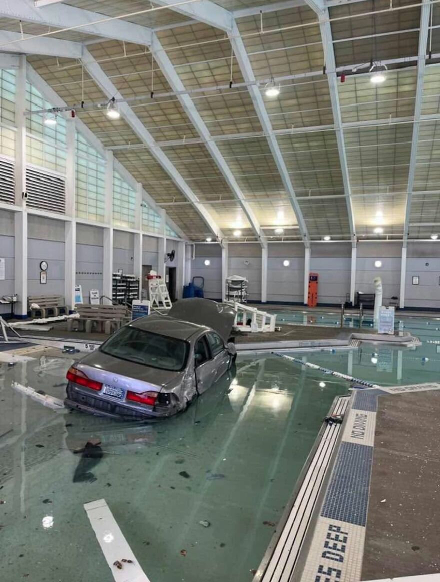 A car had a rough day behind the wheel ending up in an indoor swimming pool.
