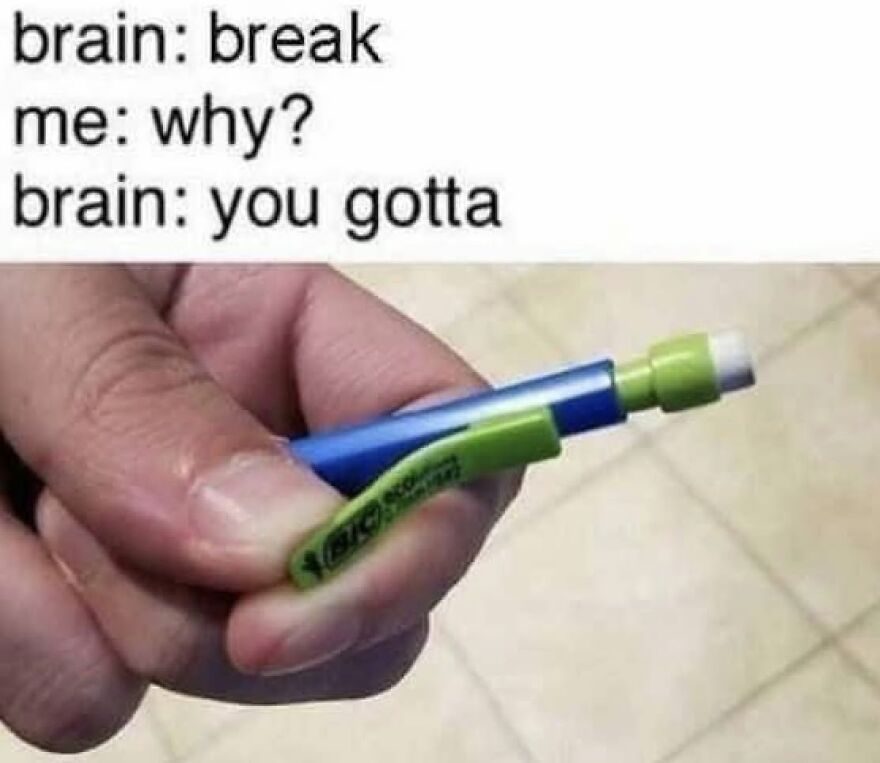 A hand holding a BIC mechanical pencil, a classic '90s babies school supply.