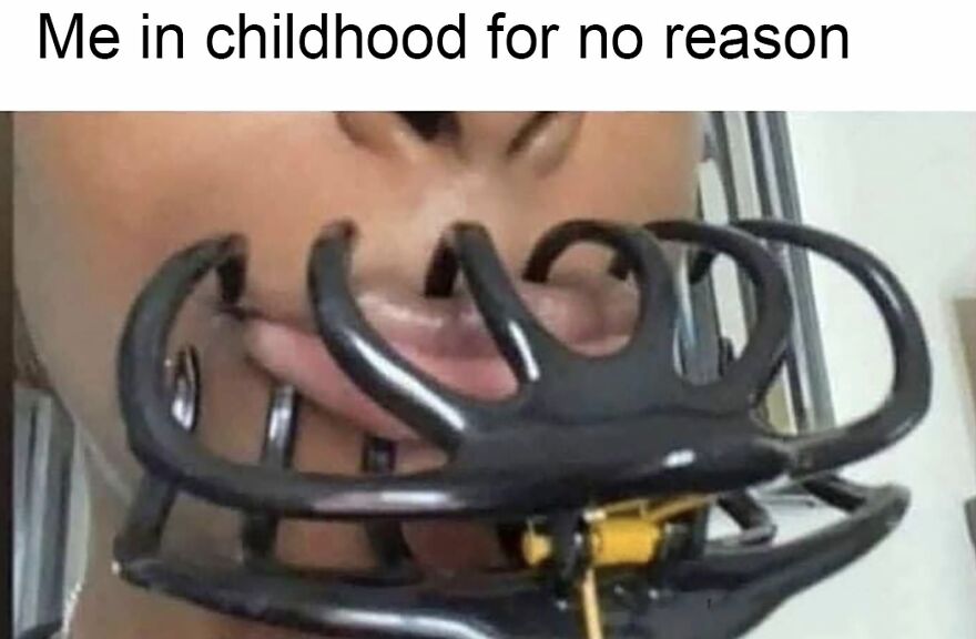 A close-up of a person's mouth with a large hair claw clipped on, a common and funny childhood memory for 90s babies.