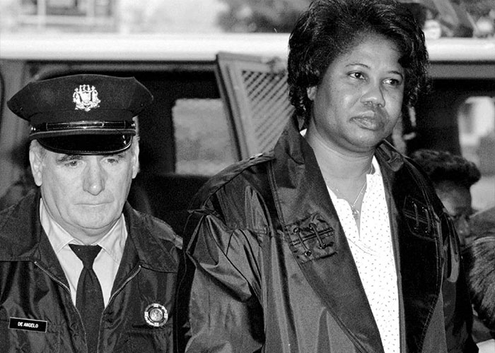 A track star's mother, Vivian King, with a police officer after her bizarre remark exposed the truth of her daughter's d***h. A track star's mother, Vivian King, with a police officer after her bizarre remark exposed the truth of her daughter's d***h.