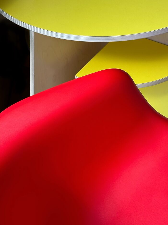 An abstract close-up of vibrant red and yellow shapes, an extraordinary winning photo from the iPhone Photography Awards.
