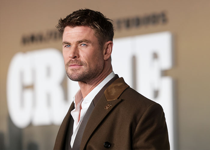 Chris Hemsworth posing at an event, relevant to a discussion about dementia symptoms and early detection. Chris Hemsworth posing at an event, relevant to a discussion about dementia symptoms and early detection.