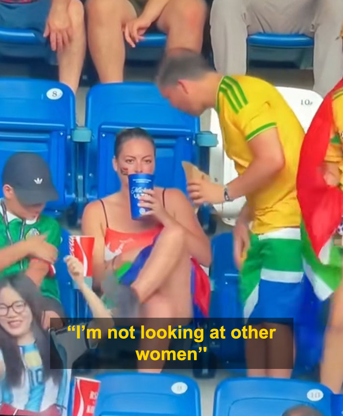 The World Cup couple after the viral moment, as the man reassures his partner he isn't looking at other women. The World Cup couple after the viral moment, as the man reassures his partner he isn't looking at other women.
