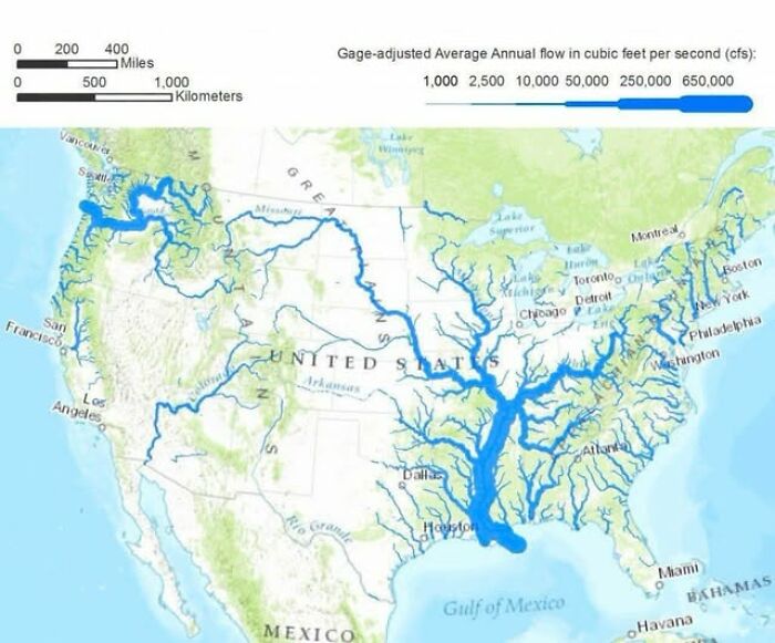 A detailed map of the United States showing gage-adjusted average annual flow in cubic feet per second for rivers, depicting the water geography.