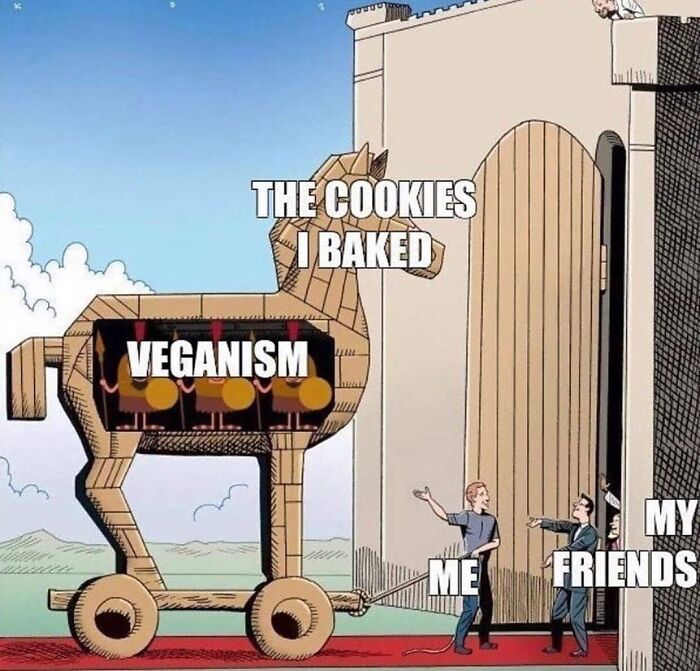 A vegan humor meme showing a person bringing a Trojan horse filled with veganism in the form of cookies to friends.