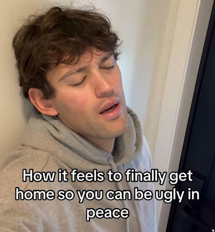 Funny posts about being a woman: A man in a grey hoodie looking relieved and comfortable at home.