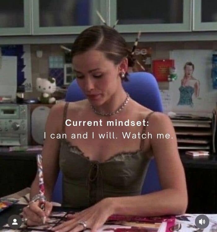 A woman at a desk with an assertive caption, reflecting funny posts about being a woman.