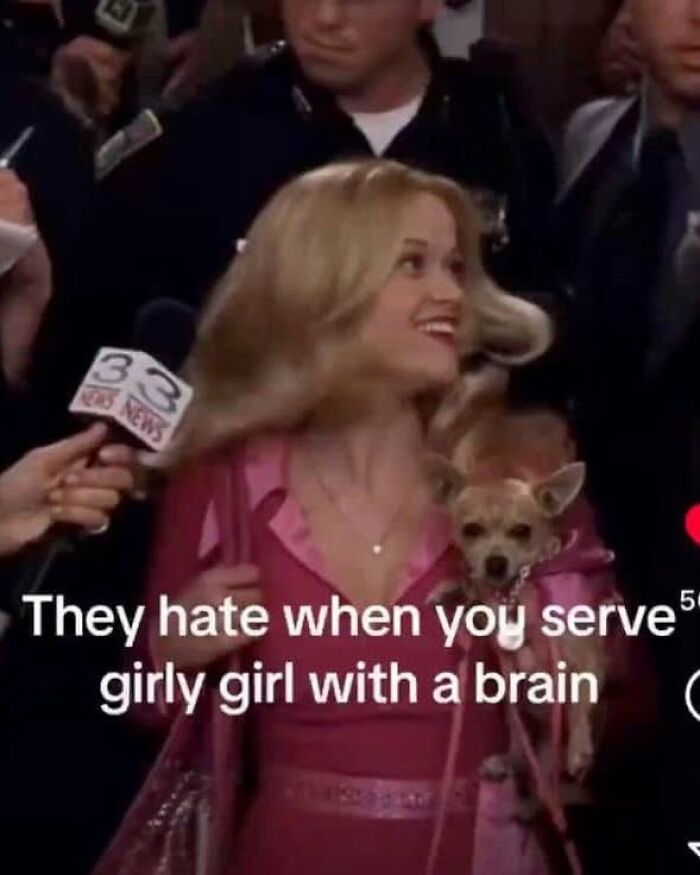 Funny posts about being a woman: Reese Witherspoon as Elle Woods with a chihuahua serving girly girl with a brain.