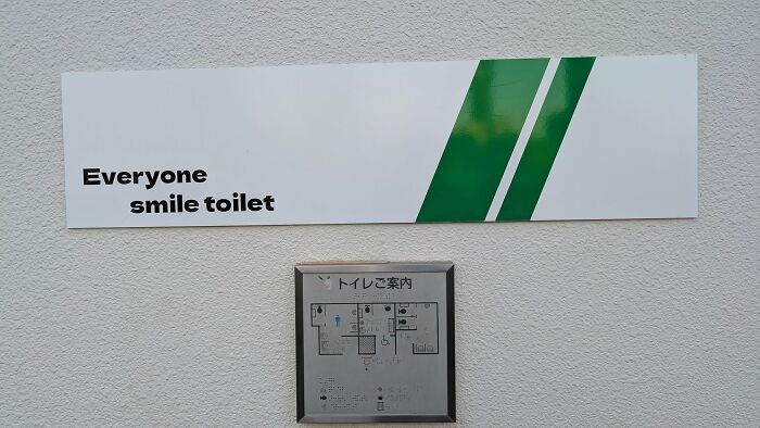 A restroom sign in Japan with the phrase Everyone smile toilet, a hilarious example of getting lost in translation.