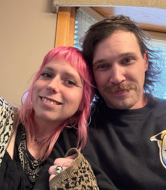 Canadian woman with pink hair smiling next to a man, central figure in the slapping Jersey Shore teen case. Canadian woman with pink hair smiling next to a man, central figure in the slapping Jersey Shore teen case.